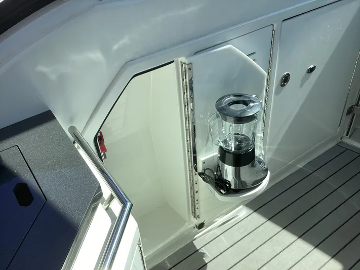 Steal Yacht Photos Pics 2020 Formula 380 Super Sport Crossover yacht interior with built-in blender on deck.