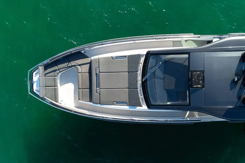 Matzu Yacht Photos Pics Top view of 2023 Azimut Verve 47 yacht on clear green water.