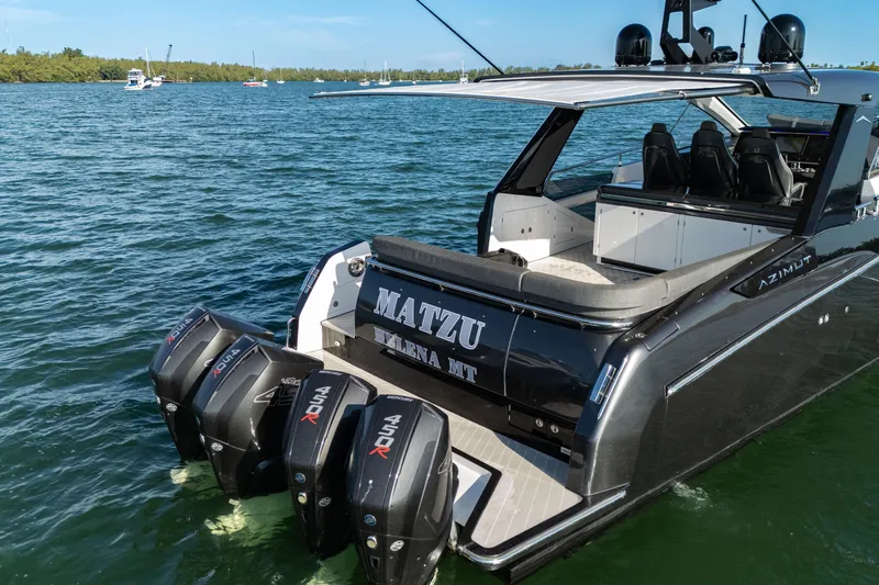 Matzu Yacht Photos Pics 2023 Azimut Verve 47 luxury yacht with powerful outboard engines on the water.