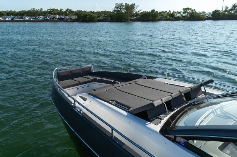 Matzu Yacht Photos Pics 2023 Azimut Verve 47 yacht with spacious deck, cruising on calm waters.