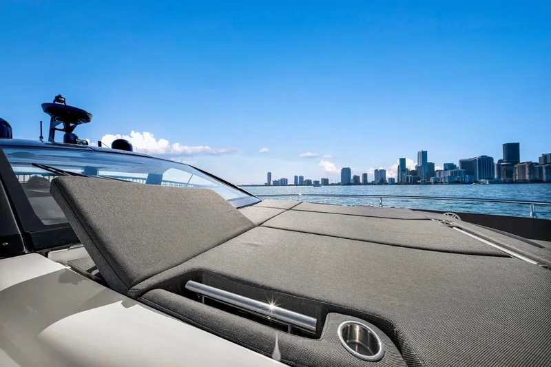 Matzu Yacht Photos Pics 2023 Azimut Verve 47 yacht with city skyline in the background.