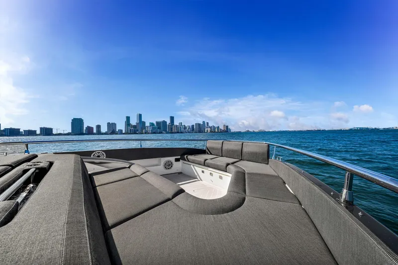Matzu Yacht Photos Pics 2023 Azimut Verve 47 yacht with city skyline and ocean view.
