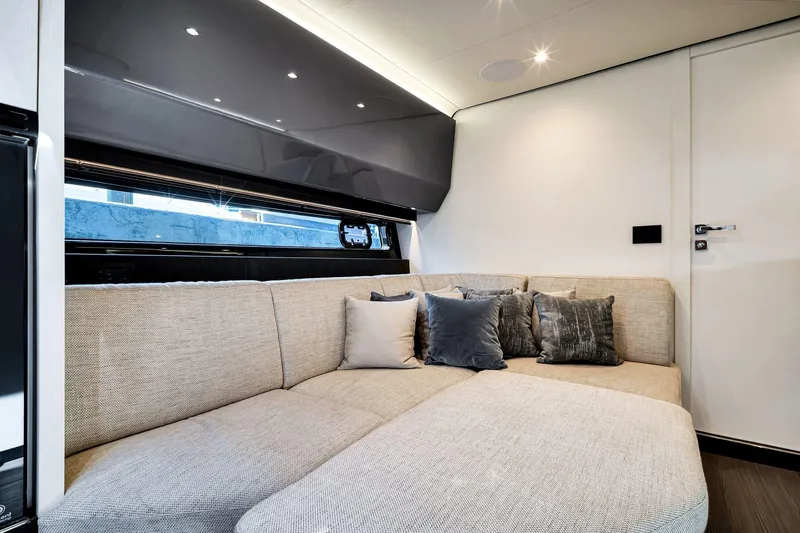 Matzu Yacht Photos Pics Luxurious interior of 2023 Azimut Verve 47 yacht with plush seating and elegant decor.