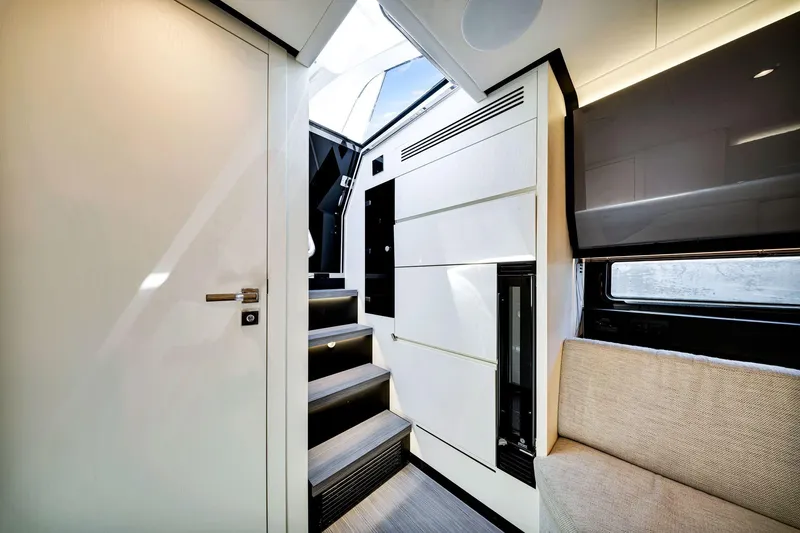 Matzu Yacht Photos Pics Interior of 2023 Azimut Verve 47 yacht, featuring modern design and sleek staircase.