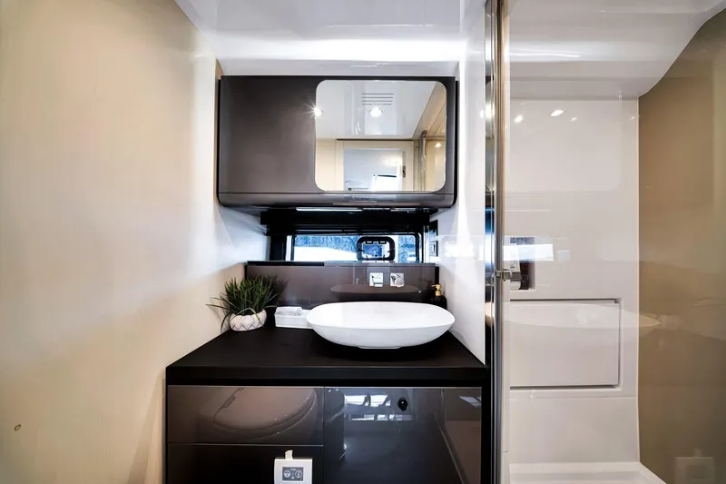 Matzu Yacht Photos Pics Modern bathroom interior of 2023 Azimut Verve 47 yacht, featuring sleek design and elegant fixtures.
