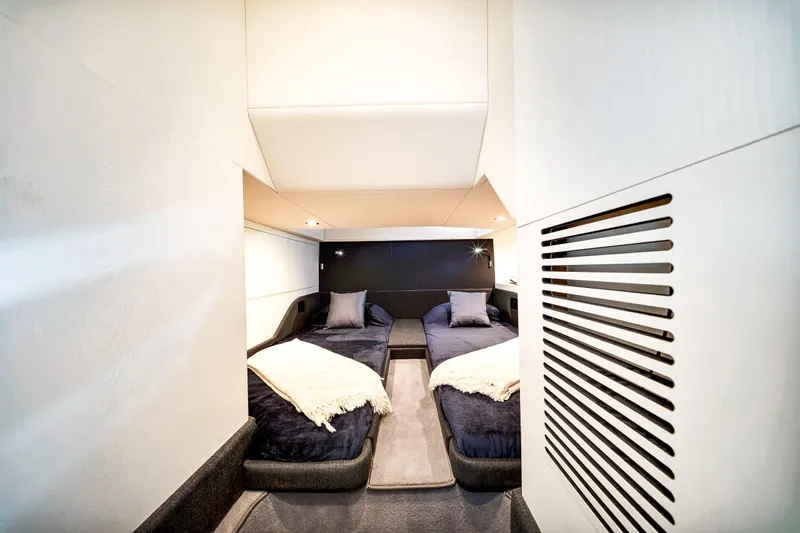 Matzu Yacht Photos Pics Luxurious interior cabin of 2023 Azimut Verve 47 yacht with twin beds and modern design.