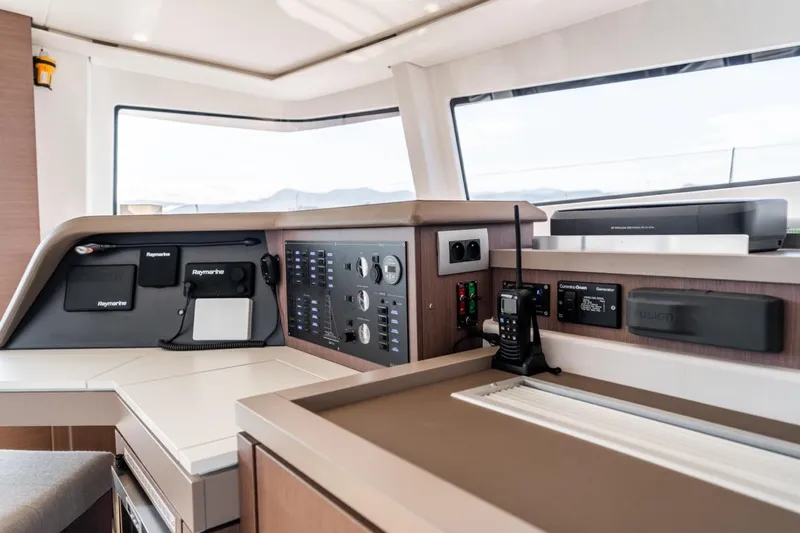 Signature Bali 5.4. (5+2 Cabins) Yacht Photos Pics Control panel of a 2021 Bali 5.4 yacht with navigation equipment.