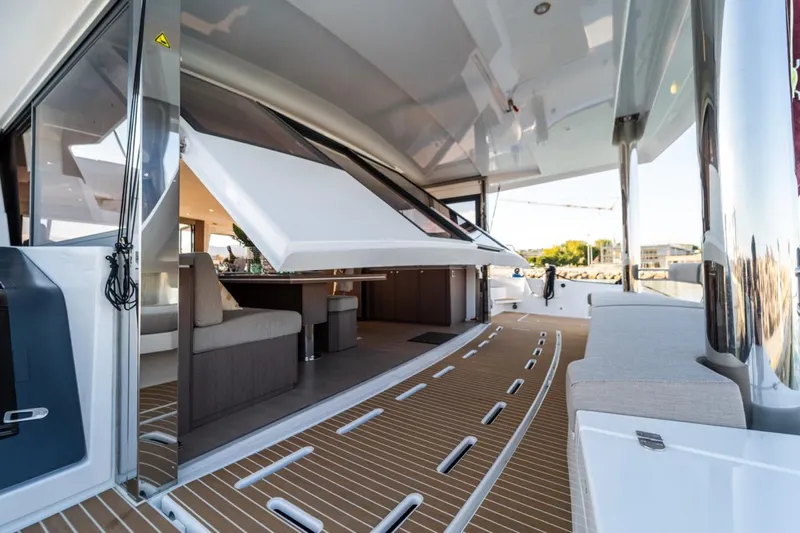 Signature Bali 5.4. (5+2 Cabins) Yacht Photos Pics Luxurious Bali 5.4 yacht interior with open deck, modern seating, and sleek design, 2021 model.
