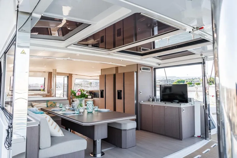 Signature Bali 5.4. (5+2 Cabins) Yacht Photos Pics Luxurious interior of 2021 Bali 5.4 yacht with dining area and modern amenities.