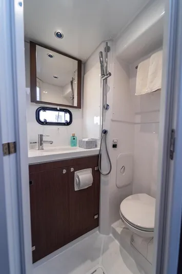 Signature Bali 5.4. (5+2 Cabins) Yacht Photos Pics Modern yacht bathroom with shower, sink, and toilet in Bali 5.4, 2021 model.