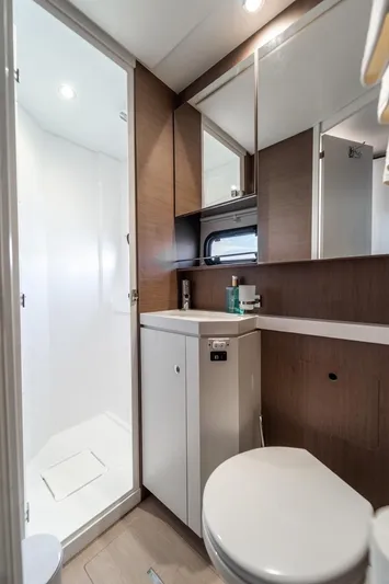 Signature Bali 5.4. (5+2 Cabins) Yacht Photos Pics Modern bathroom in 2021 Bali 5.4 model, featuring sleek design and compact layout.