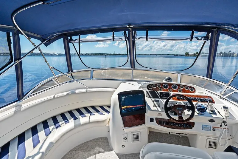  Yacht Photos Pics Luxurious 2008 Meridian 411 Sedan yacht cockpit with panoramic water views.