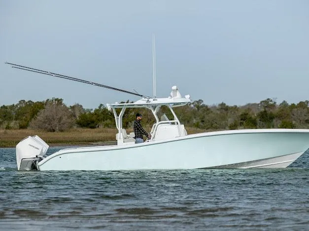  Yacht Photos Pics 2025 Yellowfin 34 Offshore boat cruising on calm waters.