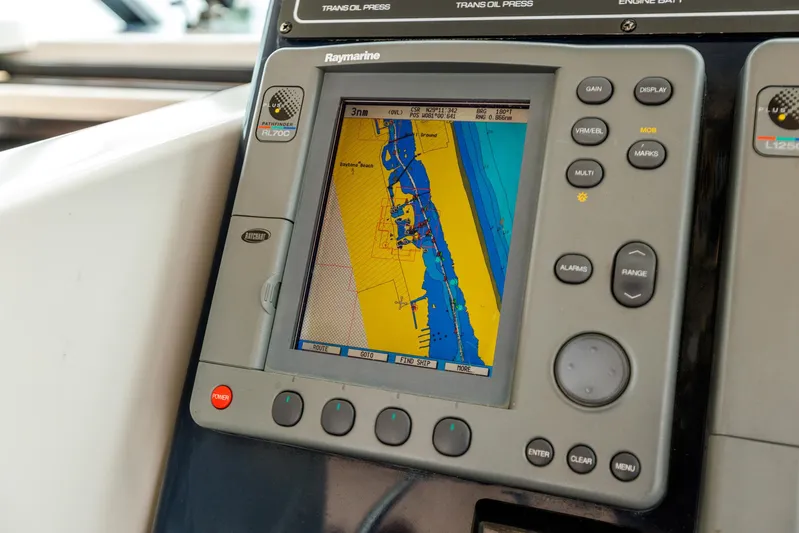 Last Call Yacht Photos Pics Raymarine navigation system on 2001 Tiara Yachts 3500 Open, displaying nautical chart.