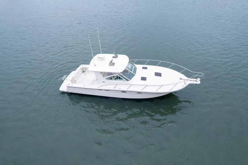 Last Call Yacht Photos Pics 2001 Tiara Yachts 3500 Open cruising on calm waters.