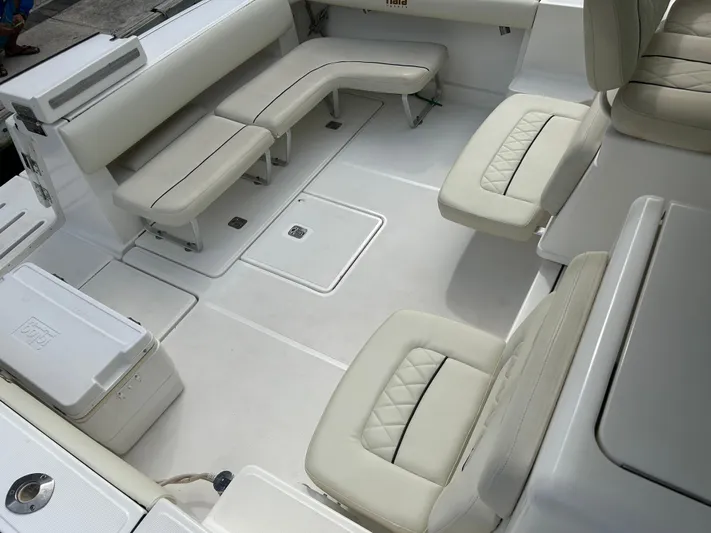 2006 Tiara 3600 Open @ Cancun Yacht Photos Pics 2006 Tiara Yachts 3600 Open interior with white seating and spacious layout.