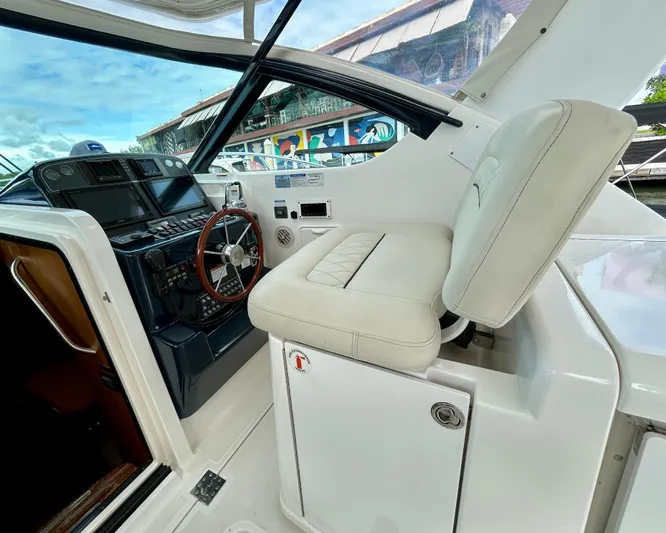 2006 Tiara 3600 Open @ Cancun Yacht Photos Pics 2006 Tiara Yachts 3600 Open helm with leather seat and control panel.