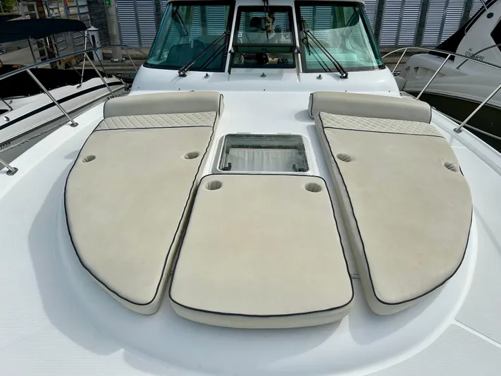 2006 Tiara 3600 Open @ Cancun Yacht Photos Pics 2006 Tiara Yachts 3600 Open with cushioned deck seating and windshield view.