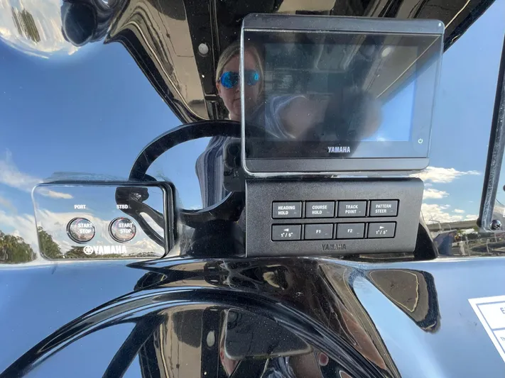 Sunset Chaser Yacht Photos Pics Control panel of 2023 Tidewater 320 CC Adventure boat with Yamaha display.