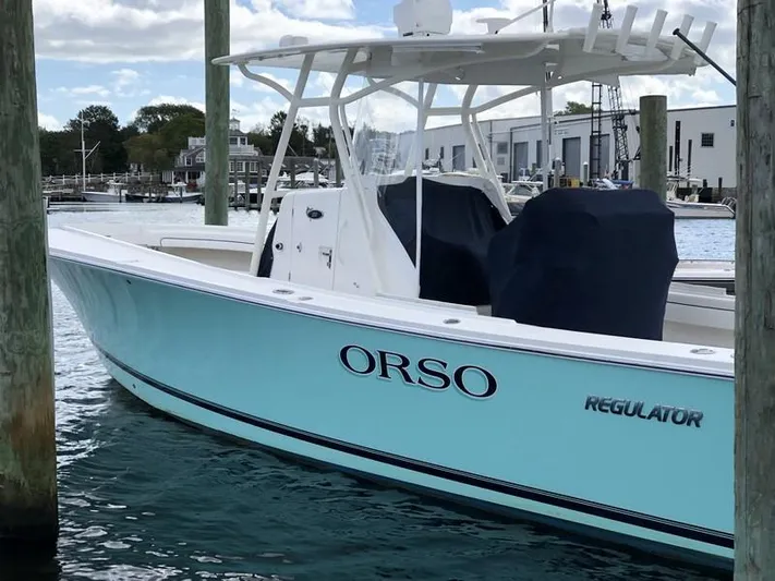 One Knot Yacht Photos Pics 2018 Regulator 31 boat named "ORSO" docked in a marina.