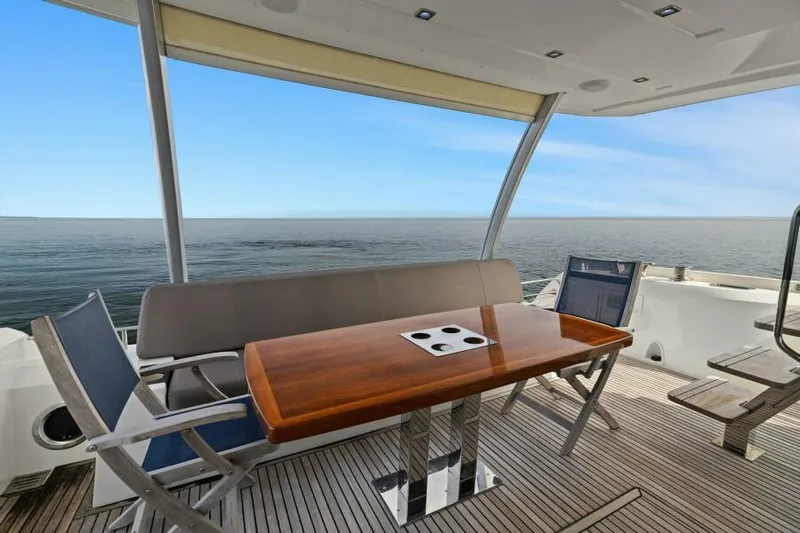 Be As You Are Xl Yacht Photos Pics Prestige 680 Flybridge 2017 yacht deck with seating and ocean view.