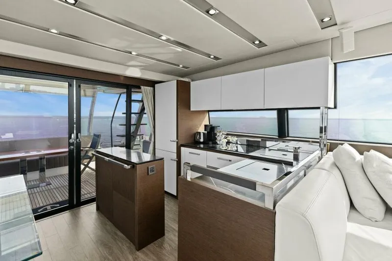 Be As You Are Xl Yacht Photos Pics Luxurious 2017 Prestige 680 Flybridge yacht interior with modern kitchen and ocean view.