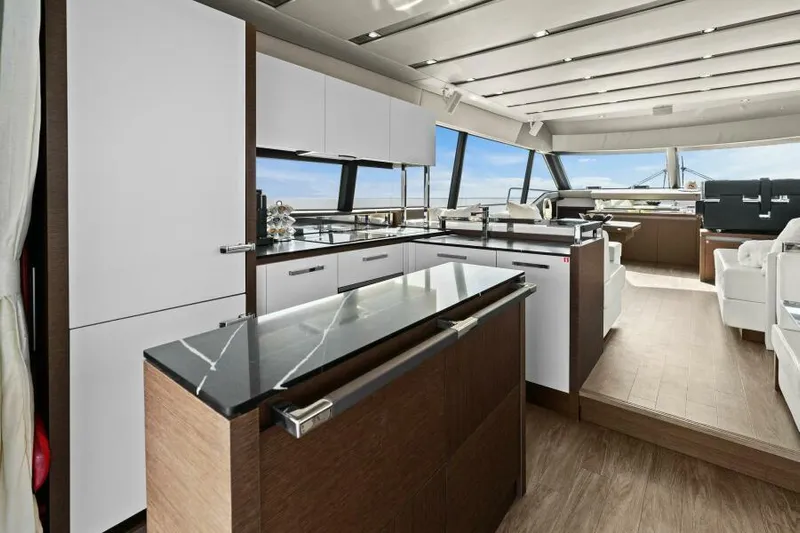 Be As You Are Xl Yacht Photos Pics Luxurious interior of 2017 Prestige 680 Flybridge yacht with modern kitchen and panoramic windows.