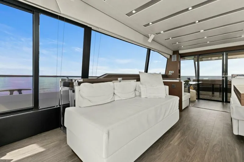 Be As You Are Xl Yacht Photos Pics Luxurious interior of 2017 Prestige 680 Flybridge yacht with modern seating and panoramic windows.