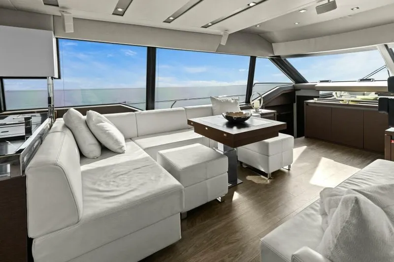 Be As You Are Xl Yacht Photos Pics Luxurious interior of 2017 Prestige 680 Flybridge yacht with modern white seating and panoramic windows.