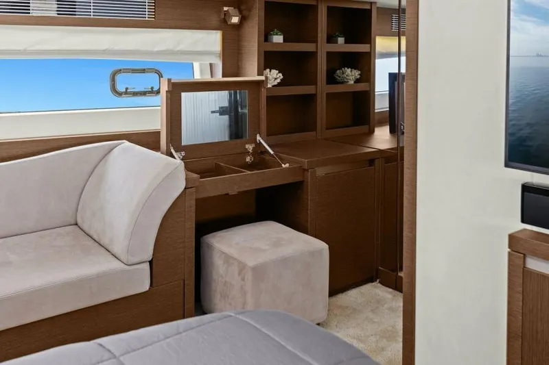 Be As You Are Xl Yacht Photos Pics Luxurious interior of 2017 Prestige 680 Flybridge yacht with elegant seating and wooden cabinetry.