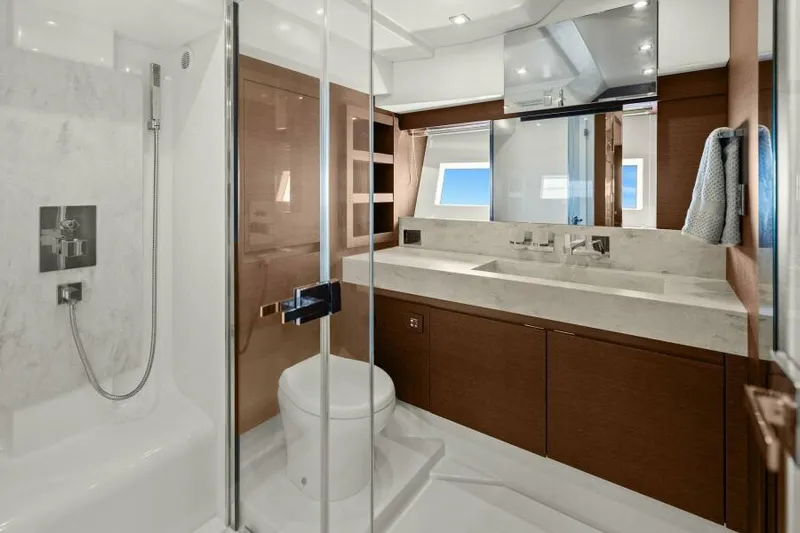 Be As You Are Xl Yacht Photos Pics Luxurious bathroom in 2017 Prestige 680 Flybridge yacht with modern fixtures and ocean view.