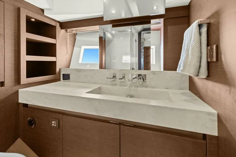 Be As You Are Xl Yacht Photos Pics Luxurious bathroom in 2017 Prestige 680 Flybridge yacht with modern fixtures and elegant design.