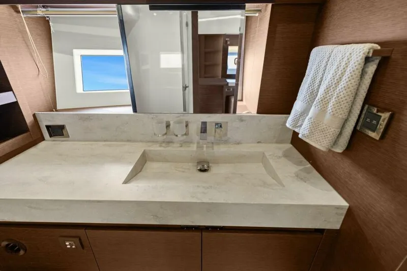 Be As You Are Xl Yacht Photos Pics Luxury bathroom sink in 2017 Prestige 680 Flybridge yacht, featuring modern design and elegant fixtures.