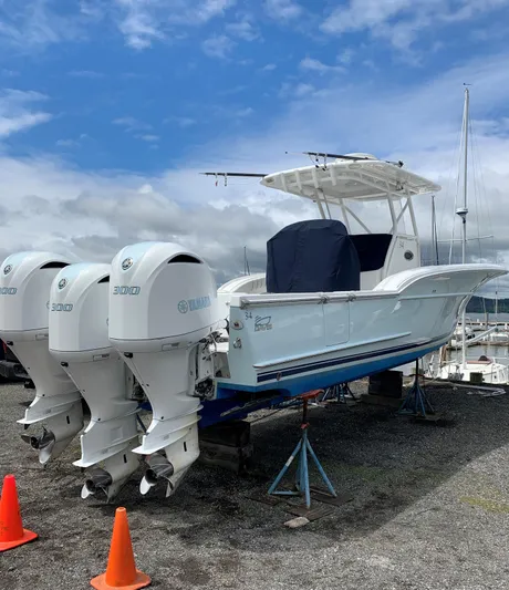  Yacht Photos Pics 2017 Buddy Davis 34 Center Console boat with triple Yamaha outboard engines on a trailer.