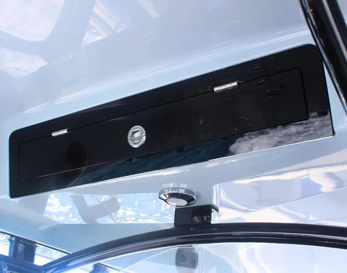  Yacht Photos Pics 2025 Fountain 34 CC boat interior detail with sleek black panel and modern design.