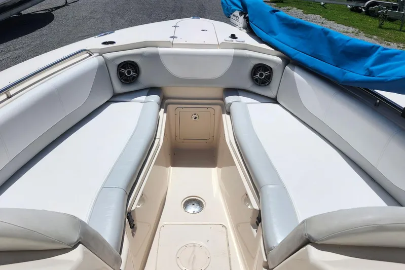  Yacht Photos Pics 2012 Grady-White Freedom 307 boat interior with cushioned seating and speakers.