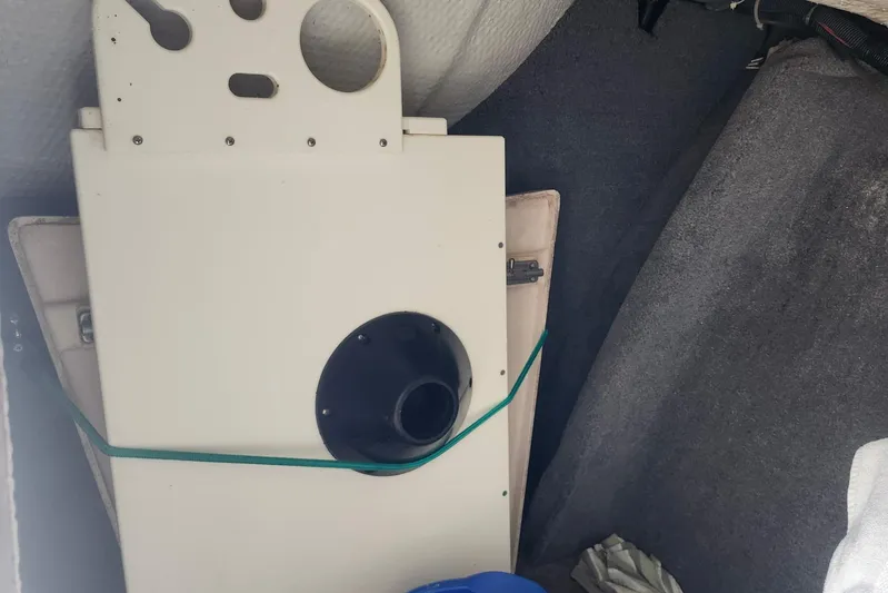  Yacht Photos Pics Interior of a 2012 Grady-White Freedom 307 boat with storage compartment.