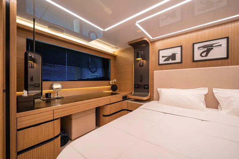  Yacht Photos Pics Luxurious Pearl 62 yacht bedroom interior, 2023 model, featuring modern design and elegant furnishings.