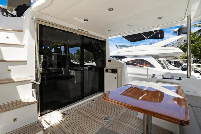  Yacht Photos Pics Luxurious 2019 Azimut 50 Fly yacht deck with sleek design and modern amenities.