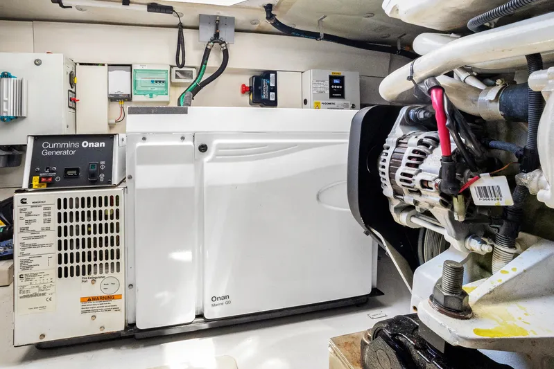  Yacht Photos Pics Engine room of 2019 Azimut 50 Fly featuring Cummins Onan generator.