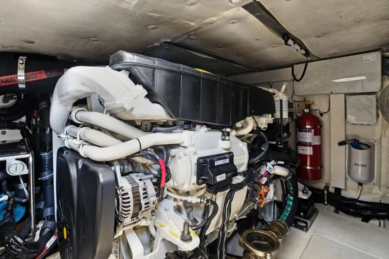  Yacht Photos Pics Engine room of 2019 Azimut 50 Fly yacht, featuring complex machinery and equipment.