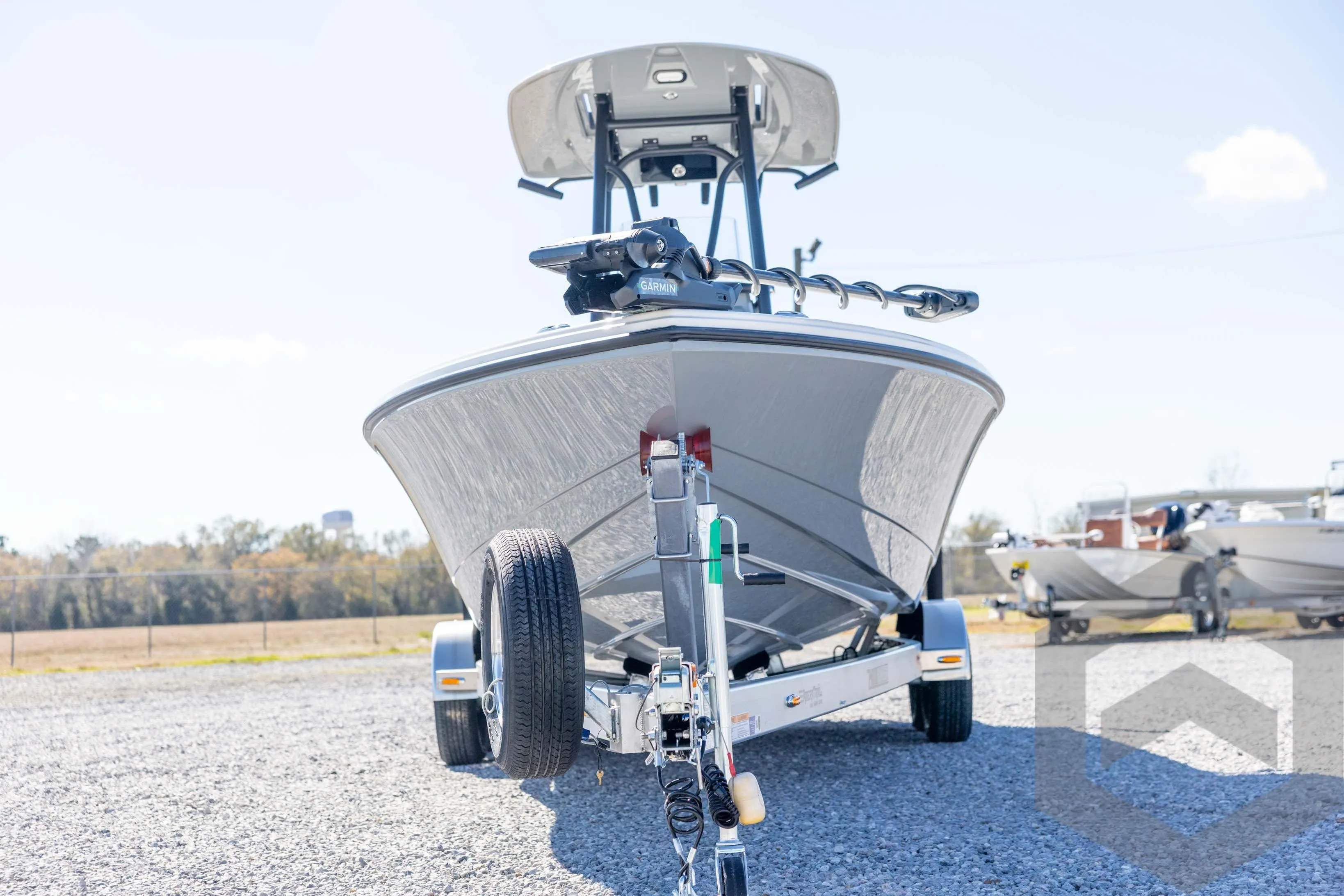 2026 Pathfinder 2500 Hybrid boat on trailer, outdoor display.