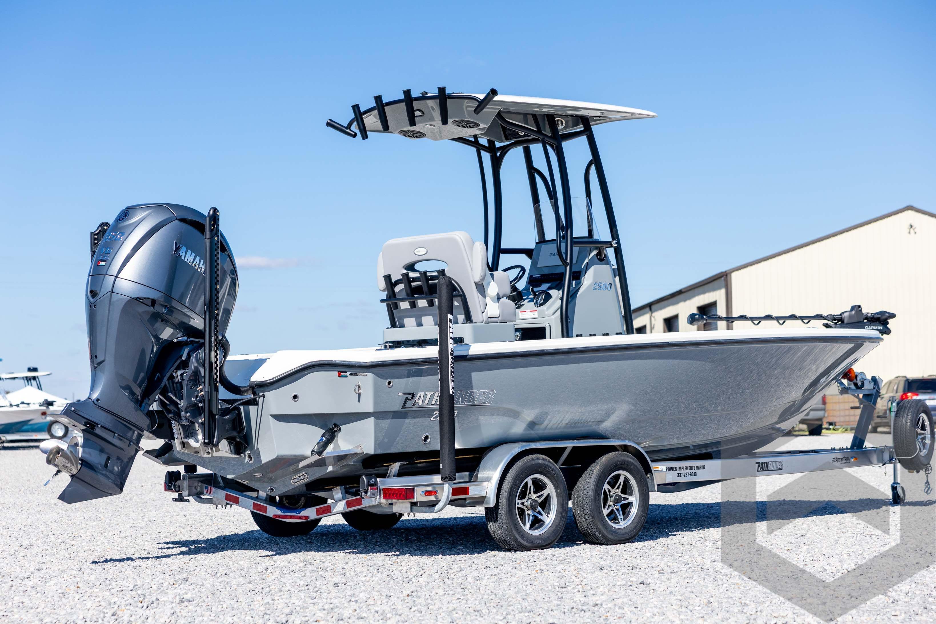 2026 Pathfinder 2500 Hybrid boat on trailer with Yamaha outboard motor, parked outdoors.