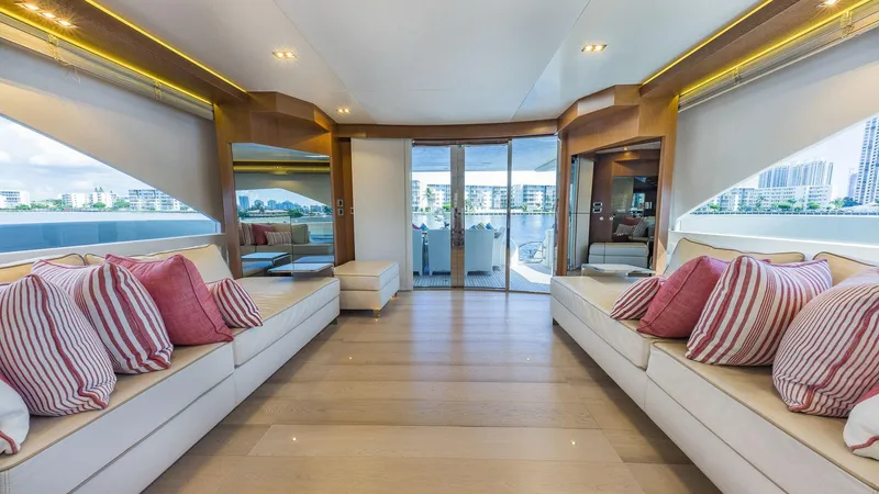 Golden 3 Yacht Photos Pics Luxurious interior of 2015 Dominator 800 yacht with elegant seating and scenic views.