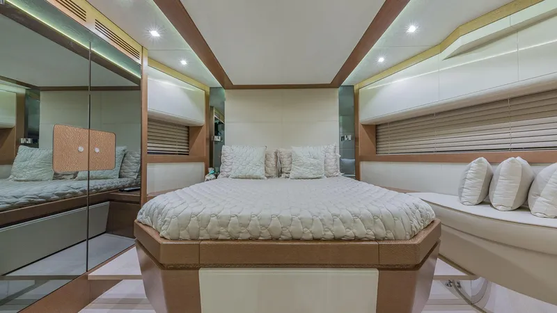 Golden 3 Yacht Photos Pics Luxurious bedroom interior of 2015 Dominator 800 yacht with modern design and ambient lighting.