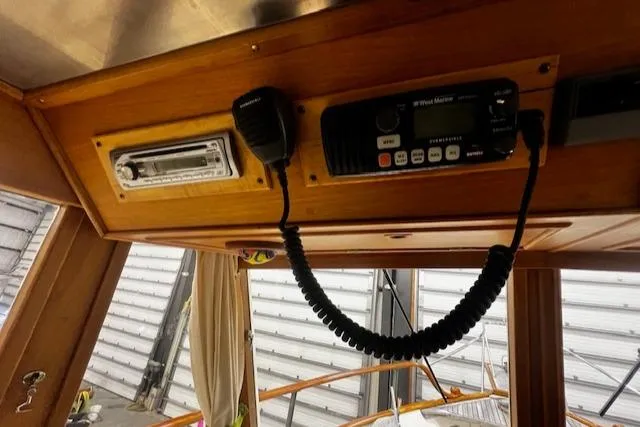 North Star Yacht Photos Pics 1984 Grand Banks Trawler interior with radio and microphone setup.
