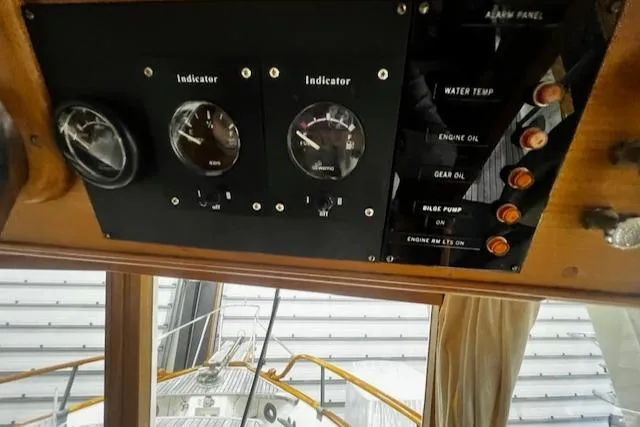 North Star Yacht Photos Pics Control panel of a 1984 Grand Banks Trawler with gauges and indicators.