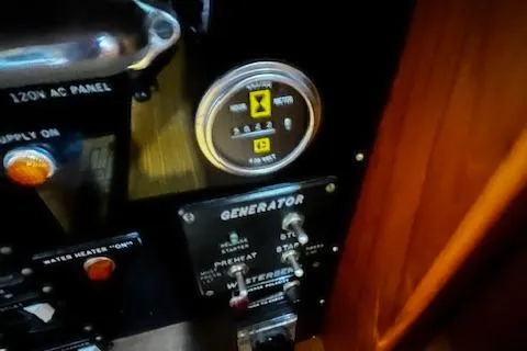 North Star Yacht Photos Pics Control panel of a 1984 Grand Banks Trawler, featuring generator and electrical switches.