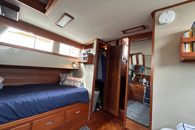  Yacht Photos Pics Interior of 1988 Grand Banks 42 Classic yacht with cozy cabin and wooden furnishings.