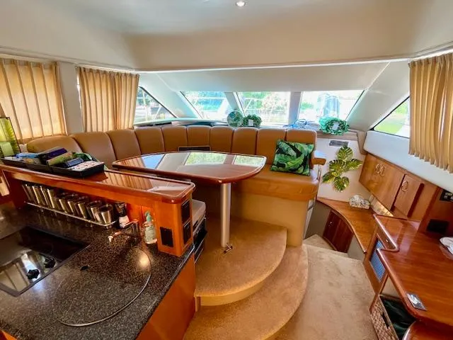 "kimberly Cay" Yacht Photos Pics Luxurious interior of a 2003 Carver 360 Sport Sedan with elegant seating and modern amenities.